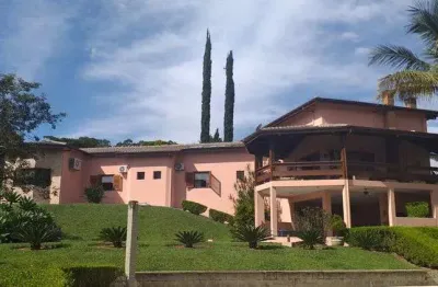 Maravilhosa casa no condomínio chamonix térrea para venda possui 406 metros quadrados com 4 suítes