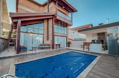 Casa em condomínio fechado com 4 quartos à venda na alameda garoupa, 218, alphaville, santana de parnaíba por r$ 3.195.000