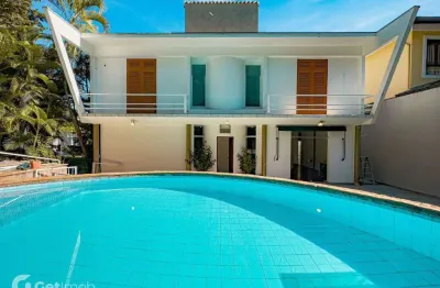 Casa em condomínio fechado com 4 quartos à venda na alameda maracatins, 210, alphaville, santana de parnaíba por r$ 3.800.000
