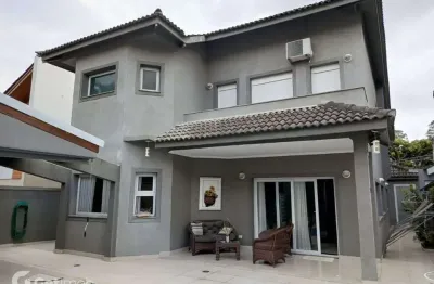 Casa em condomínio fechado com 4 quartos à venda na alameda dos girassóis, 1221, alphaville, santana de parnaíba por r$ 3.600.000