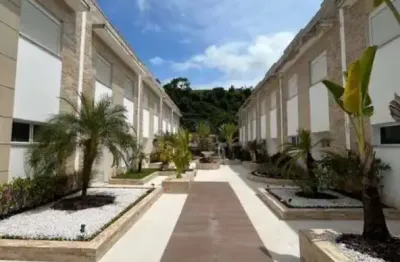Casa no guarujá com 4 suítes com armários planejados e 4 vagas de garagem