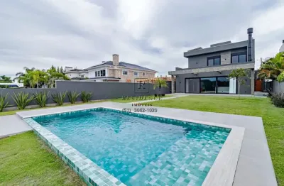 Casa em condomínio fechado com 4 quartos à venda na avenida juca batista, 8000, belém novo, porto alegre, 327 m2 por r$ 3.950.000