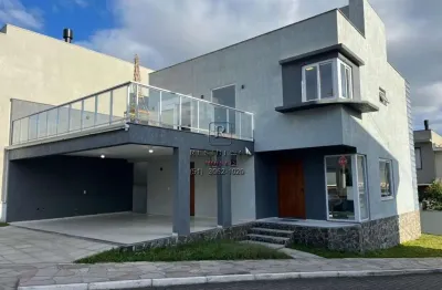 Casa em condomínio fechado com 3 quartos à venda na rua ivo walter kern, 599, hípica, porto alegre, 225 m2 por r$ 1.200.000