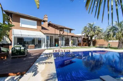 Casa em condomínio fechado com 4 quartos à venda na avenida juca batista, 8000, belém novo, porto alegre, 511 m2 por r$ 4.600.000