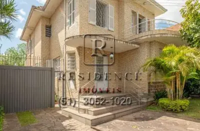 Casa com 3 quartos à venda na rua general gomes carneiro, 258, medianeira, porto alegre, 1100 m2 por r$ 990.000