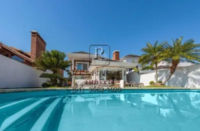 Casa em condomínio fechado com 3 quartos à venda na avenida juca batista, 8000, belém novo, porto alegre, 338 m2 por r$ 3.500.000