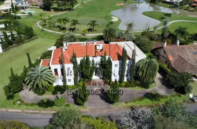 Casa em condomínio fechado com 4 quartos à venda na avenida juca batista, 8000, belém novo, porto alegre, 724 m2 por r$ 7.000.000