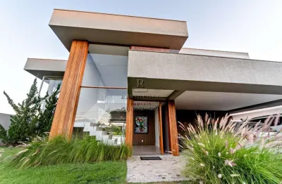 Casa em condomínio fechado com 3 quartos à venda na avenida juca batista, 8000, belém novo, porto alegre, 380 m2 por r$ 4.000.000
