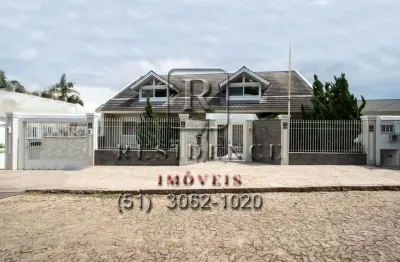 Casa com 5 quartos à venda na rua chiriguano, 89, vila assunção, porto alegre, 817 m2 por r$ 3.500.000