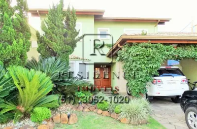 Casa em condomínio fechado com 4 quartos à venda na avenida juca batista, 8000, belém novo, porto alegre, 386 m2 por r$ 2.700.000