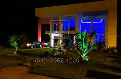 Casa em condomínio de luxo com 3 suítes no centro de imbé-rs: 3 quartos, 3 salas e 500m² de área