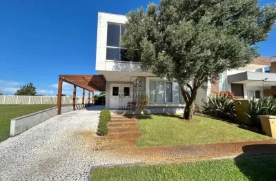 Casa de luxo em condomínio à venda em capão da canoa-rs, com 4 quartos, 4 suítes e 210m² de área. confira já!