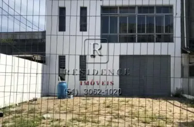 Depósito comercial de 250m² com 1 banheiro para locação em Porto Alegre-RS, bairro Navegantes!