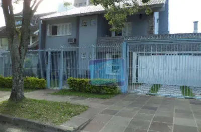 Casa com 4 quartos à venda na Rua Menachem Begin, Jardim Planalto, Porto Alegre