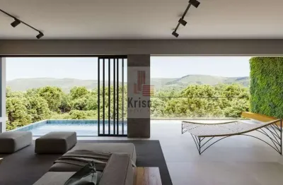 Linda casa moderna com projeto integrado e vista deslumbrante!