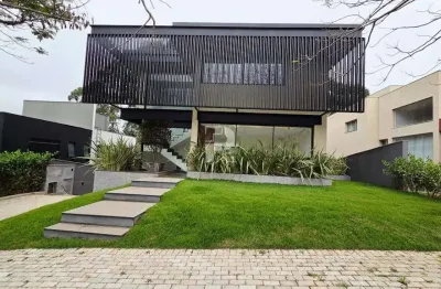 Casa nova e moderna com vista para lagoa e mata – 4 suítes no alphaville lagoa dos ingleses!