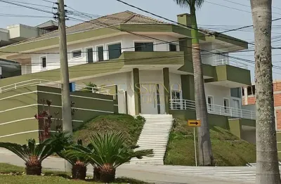 Sobrado para venda e locação de 900m² | 05 dormitórios, sendo suítes e 08 vagas de garagem | condomínio residencial jaguary - urbanova | são josé dos campos |