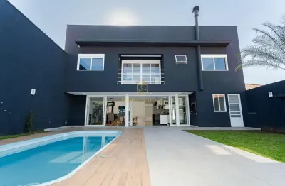 Residência de alto padrão  mobiliada  389m  privativos  3 suítes  piscina aquecida  uberaba