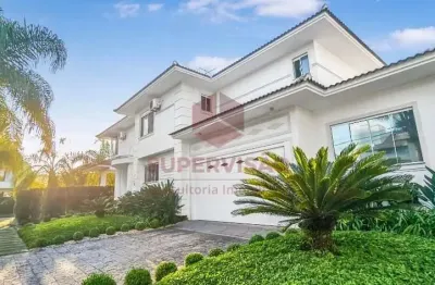 Casa com 4 quartos à venda na rua dos marimbaus, 656, jurerê internacional, florianópolis por r$ 4.800.000