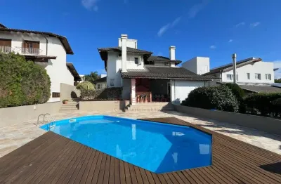 Casa em condomínio fechado com 3 quartos à venda na Rodovia Haroldo Soares Glavan, 3820, Cacupé, Florianópolis por R$ 3.250.000