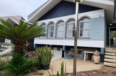 Casa com 3 quartos à venda na rua paulino chaves, santo antônio, porto alegre, 250 m2 por r$ 1.117.000