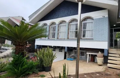 Casa com 3 quartos à venda na rua paulino chaves, 427, santo antônio, porto alegre por r$ 1.117.000