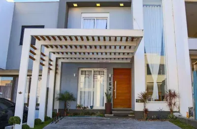 Sobrado com 3 dormitórios à venda, 137 m² por r$ 890.000,00 - primavera - gravataí/rs