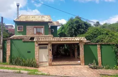 Casa com 3 dormitórios à venda, 150 m² por R$ 650.000,00 - Bela Vista - Gravataí/RS