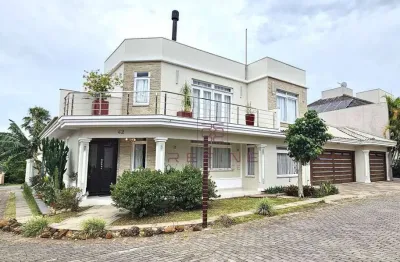 Casa à venda, 300 m² por r$ 1.900.000,00 - condomínio residencial dom feliciano - gravataí/rs