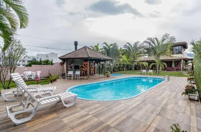 Casa em condomínio fechado com 4 quartos para alugar na servidão teixeira, 411, campeche, florianópolis, 450 m2 por r$ 20.000