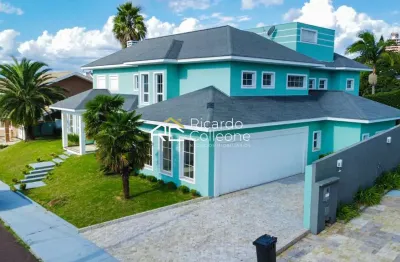 Casa em condomínio fechado, 700m2, 05 suítes, elevador, piscina.
