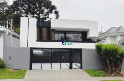 Casa nova com 4 suítes e piscina ao lado do parque barigui , no bairro mercês