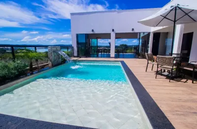 Belíssima casa de alto padrão no condomínio marinas di caldas, com 4 suítes, piscina privativa, bar