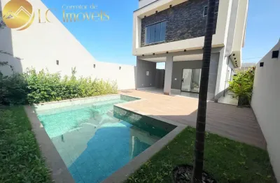 Sobrado de alto padrão no condomínio cidade das flores em caldas novas 3 suítes, piscina  e área gourmet