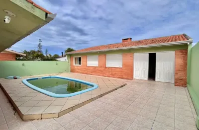 Casa 4 dormitórios com piscina no centro de xangri-la aluguel de temporada