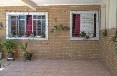 Casa com 3 dormitórios à venda, 144 m² por R$ 450.000,00 - Vila Cascatinha - São Vicente/SP