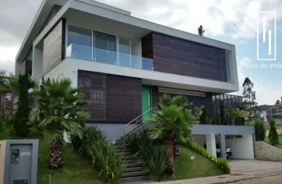 Casa em condomínio fechado com 4 quartos à venda na rodovia haroldo soares glavan, 1760, cacupé, florianópolis por r$ 6.780.000