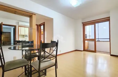 Apartamento desocupado, semi mobiliado com dois dormitórios e uma vaga no bom fim