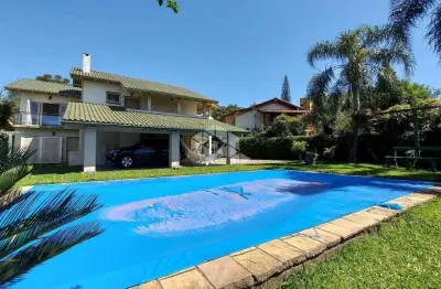 Casa em condomínio fechado com 3 quartos à venda na Avenida Firmino Octávio Bimbi, 255, Cavalhada, Porto Alegre