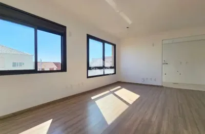 Studio desocupado com churrasqueira e uma vaga coberta