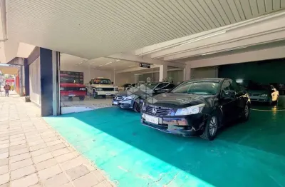Prédio comercial tradicional com acesso de frente a fundos em plena avenida farrapos
