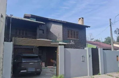 Sobrado com 3 dormitórios à venda, 290 m² por r$ 675.000,00 - jardim do bosque - cachoeirinha/rs