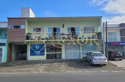 Linda casa tipo sobrado residencial e comercial em ótima  localização no centro de navegantes sc