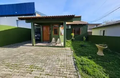 Casa ampla com três dormitórios na rua luis andriotti, bairro jardim iolanda- guaíba