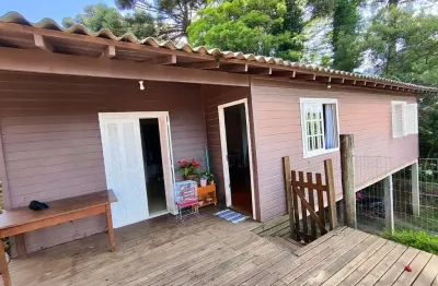 Casa com 3 dormitórios  e suíte à venda,  a apenas 5 minutos da catedral de canela .