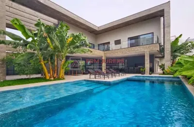 Casa em condomínio fechado com 5 quartos à venda na rua das baúnas, 53, jurerê internacional, florianópolis por r$ 13.500.000