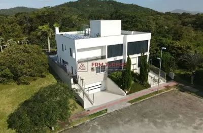Casa com 4 quartos à venda na rua das caraúnas, 463, jurerê internacional, florianópolis por r$ 12.000.000