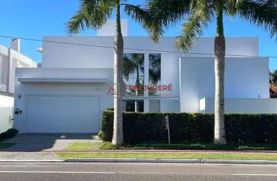 Casa com 5 quartos à venda na avenida dos búzios, 2660, jurerê internacional, florianópolis por r$ 7.850.000