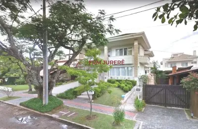 Casa à venda na rua dos amborés, 360, jurerê internacional, florianópolis por r$ 4.950.000