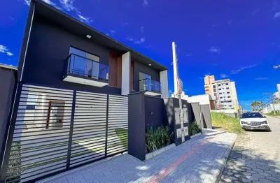 Sobrado com 3 dormitórios à venda, 136 m² por r$ 970.000 - itacolomi - balneário piçarras/sc